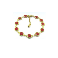 A gold-plated bracelet featuring seven oval red cabochon stones set in a row, displayed on a clean white background with product code CHB0033-16 in the corners.