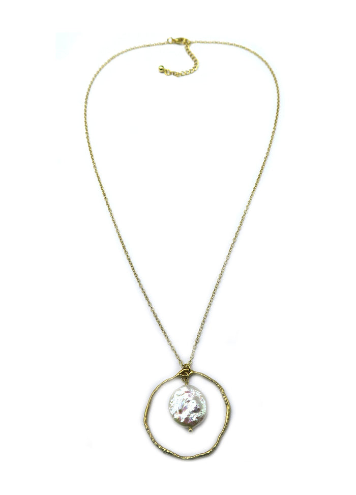 A gold chain necklace featuring a textured gold double-ring pendant with a central, irregular white pearl, displayed on a clean white background.
